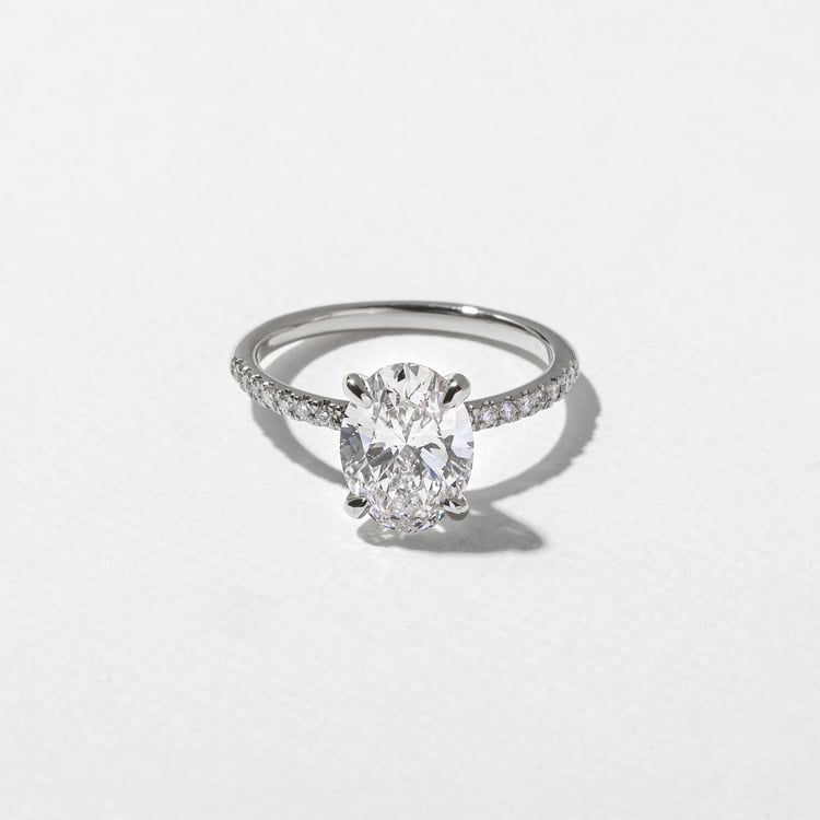 Grace Oval Solitaire with Pavé in Platinum