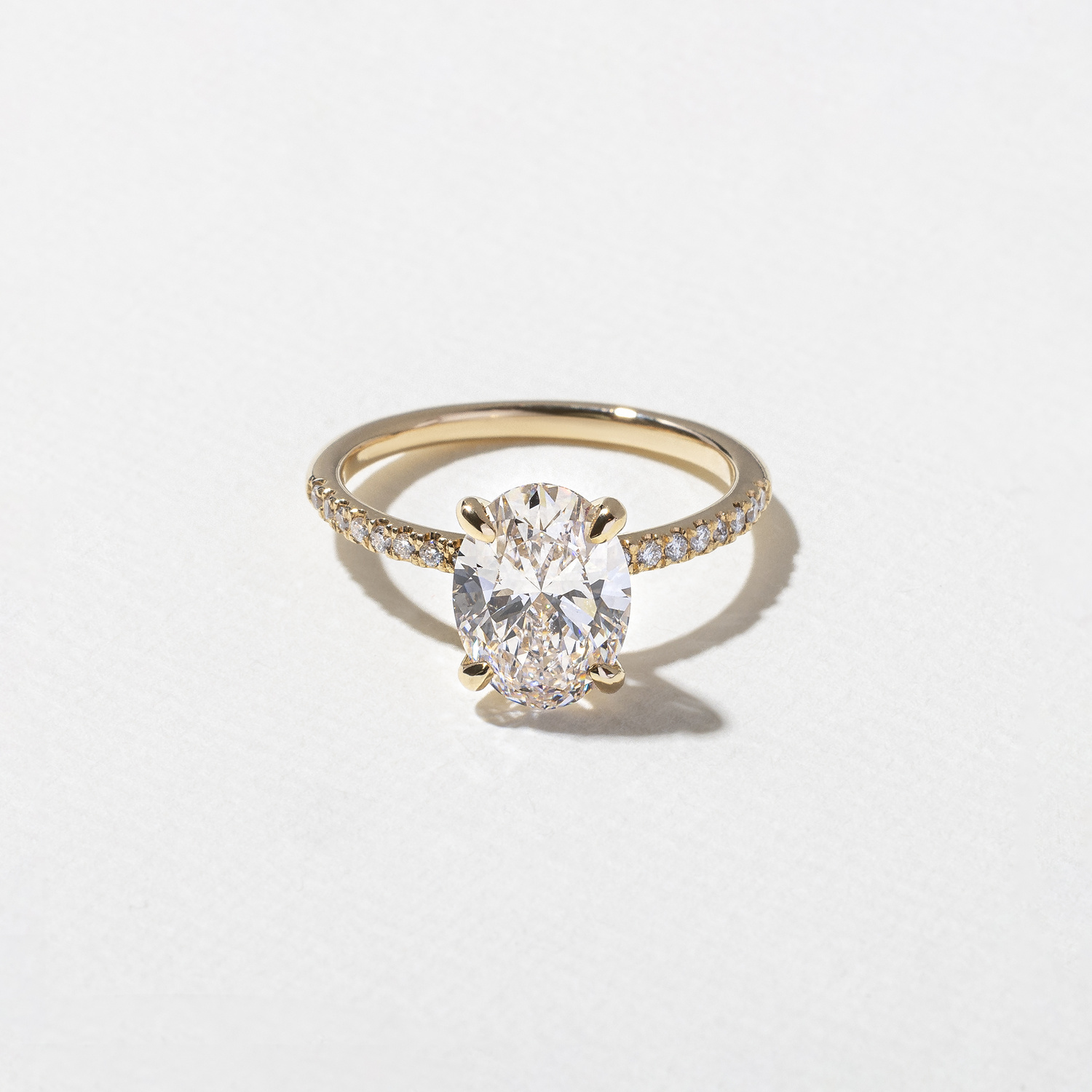 Grace Oval Solitaire with Pavé in 14k Yellow Gold
