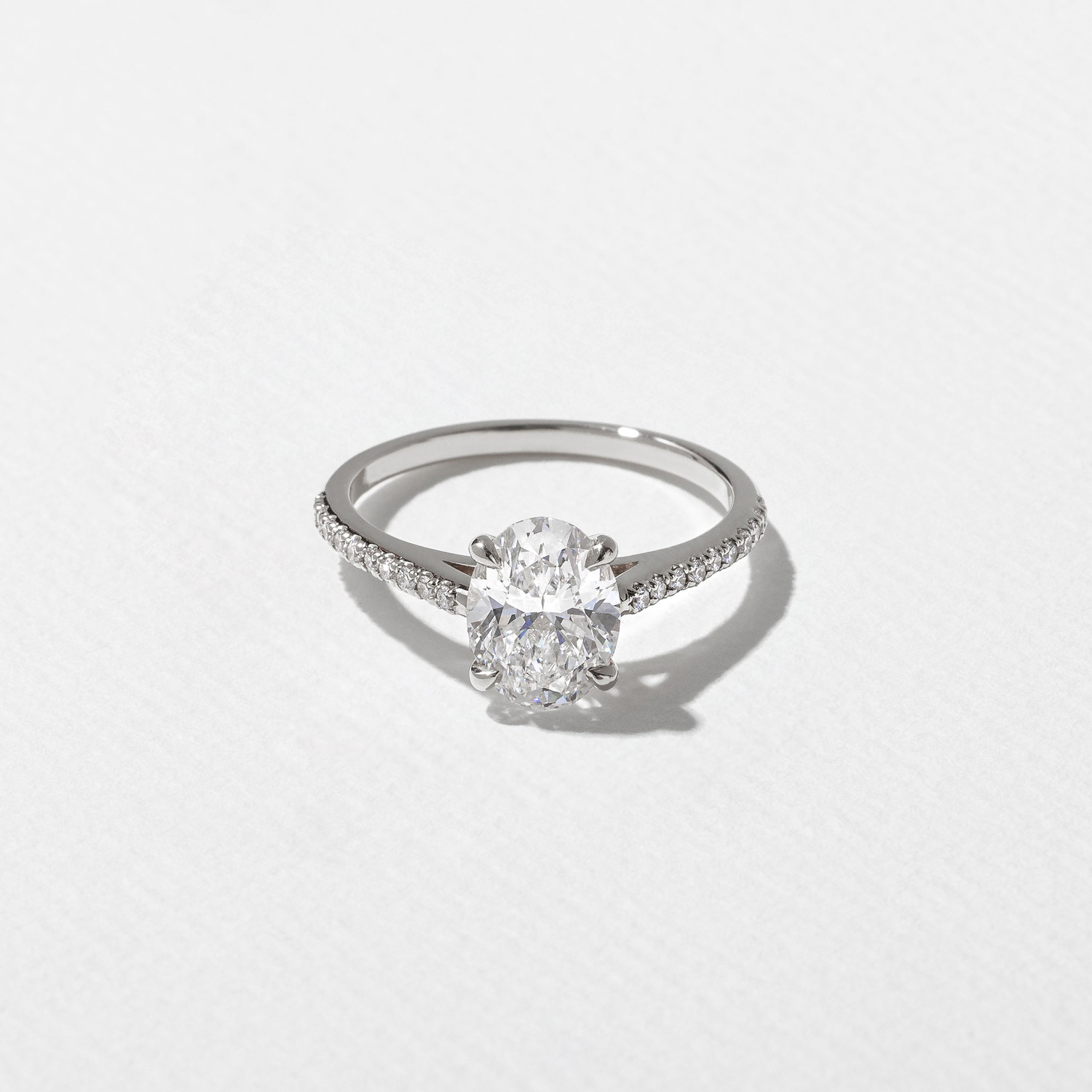 Iris Oval Solitaire with Pavé in Platinum
