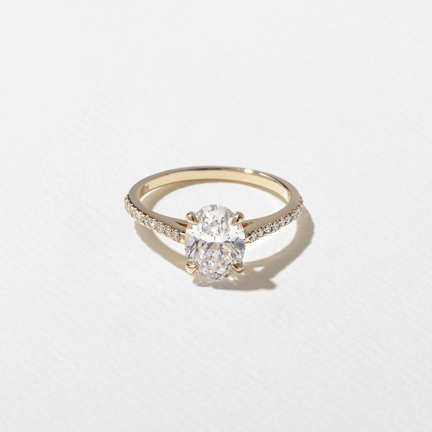 Iris Oval Solitaire with Pavé in 14k Yellow Gold