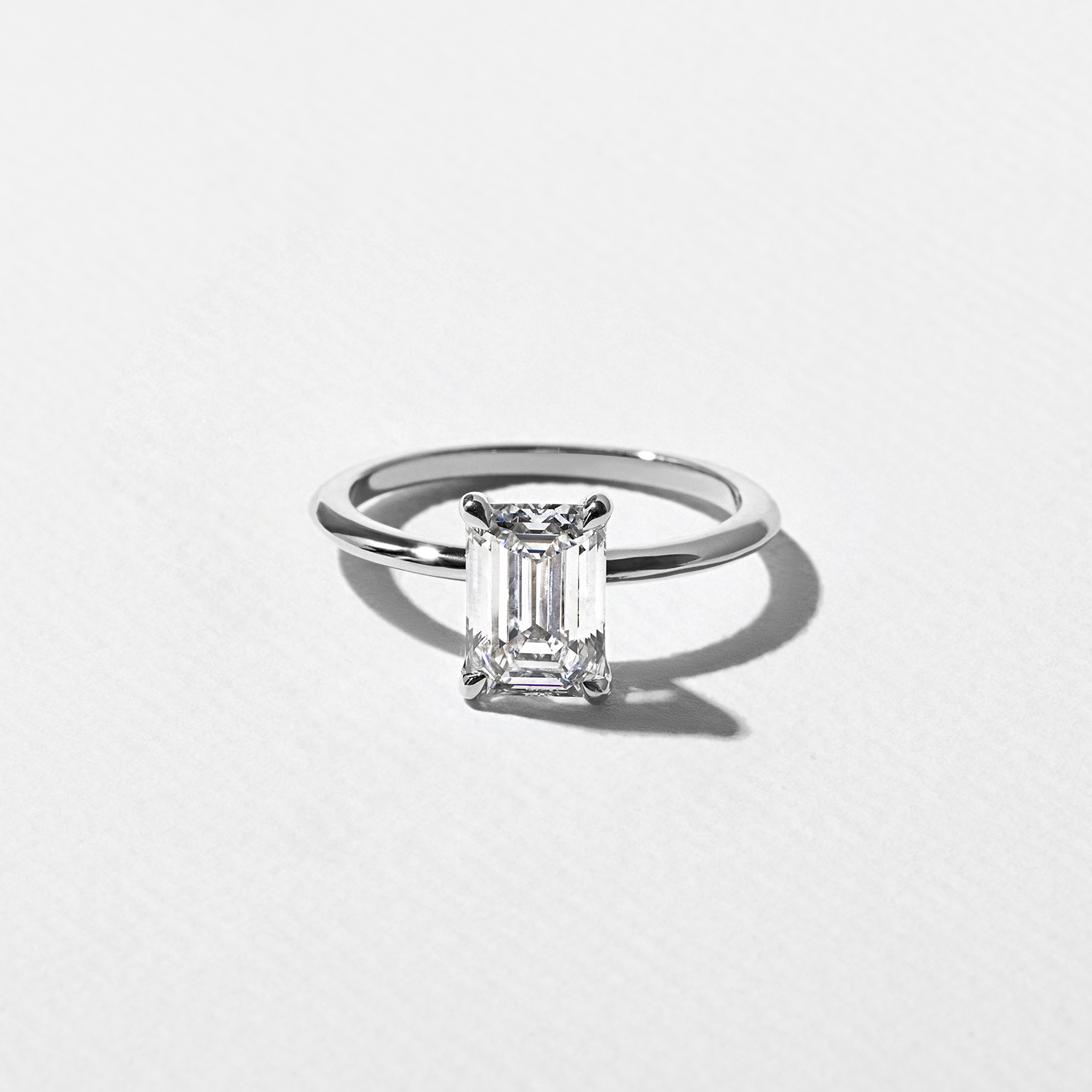 Grace Emerald-Cut Solitaire in 18k White Gold
